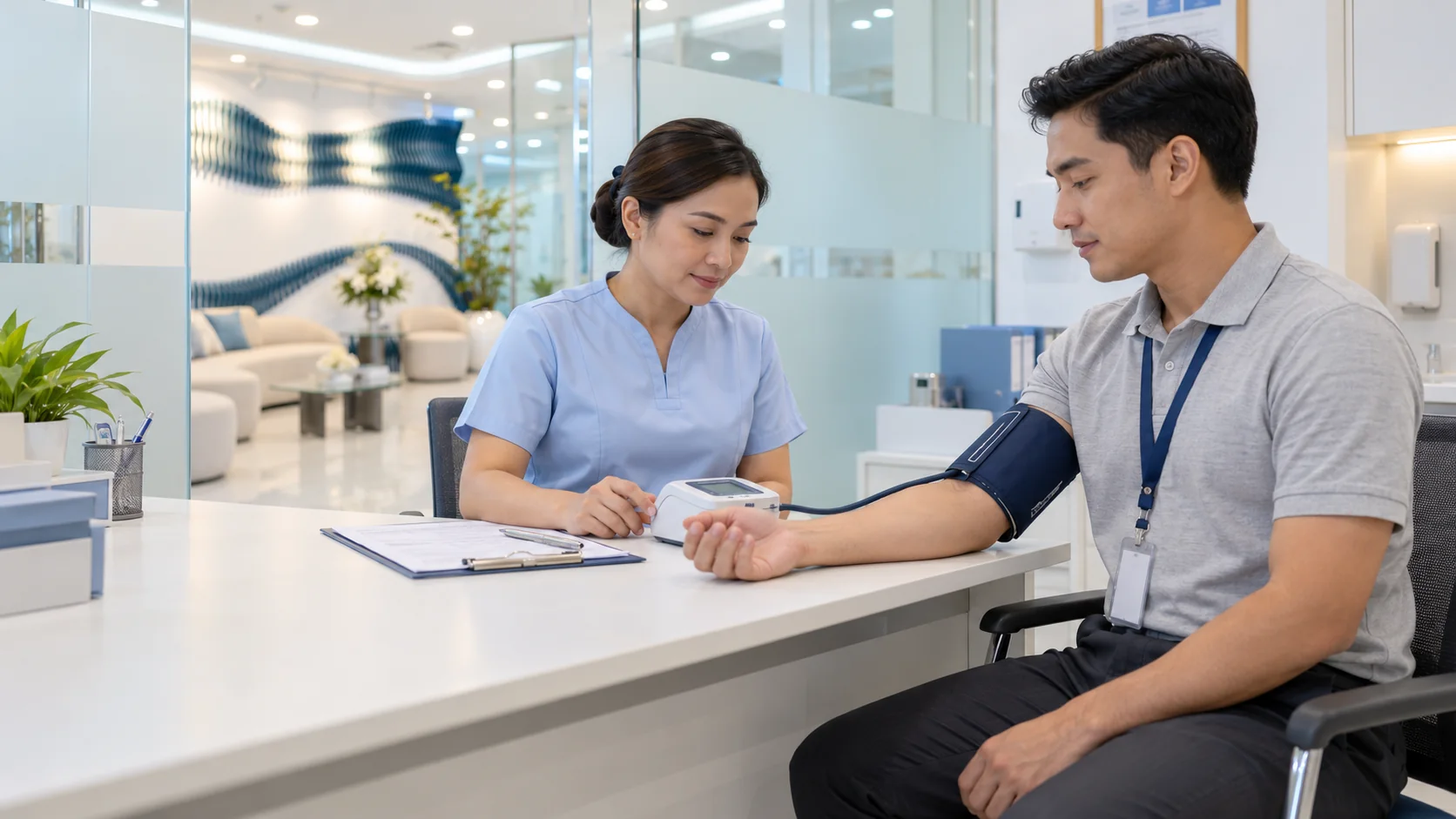 A nurse checking an employee's blood pressure during an annual physical exam